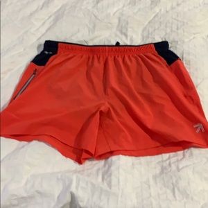 COPY - New Balance running short in Bright red an…